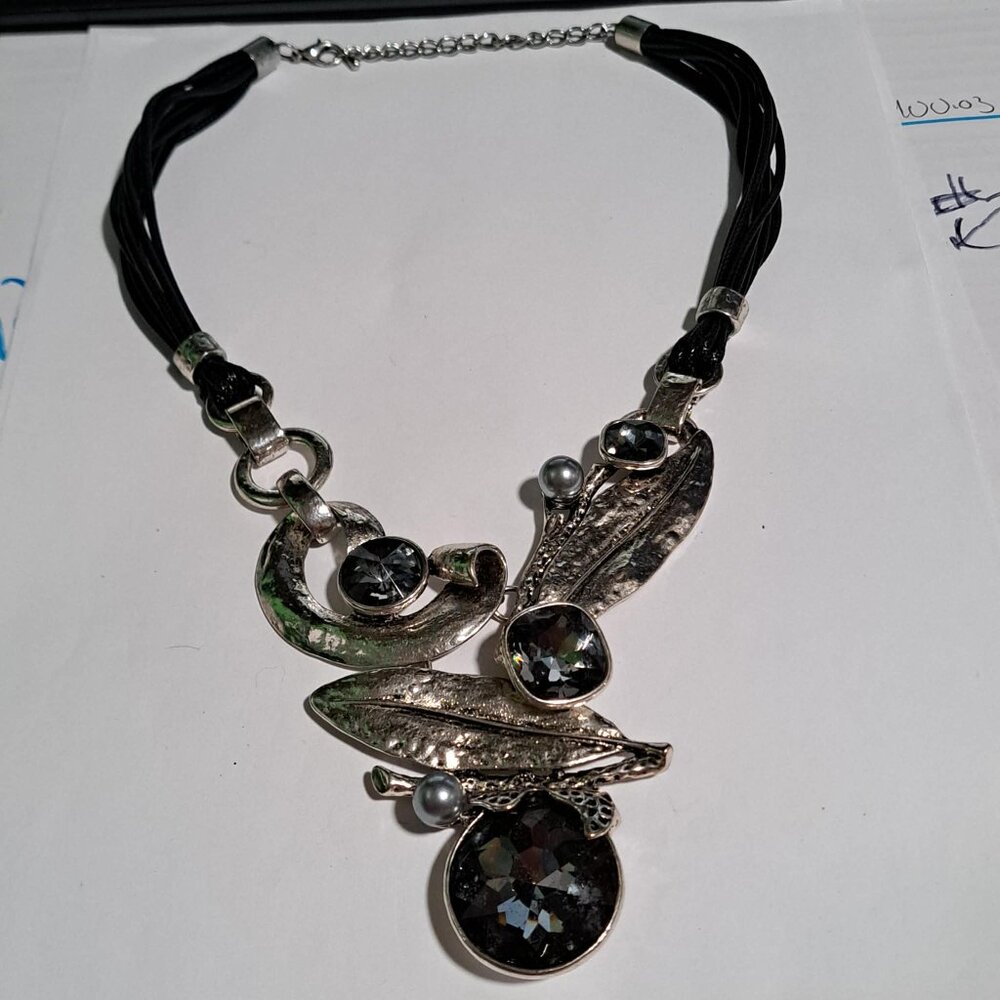 Oversized chunky silver and black color necklace with leaf design & black stones